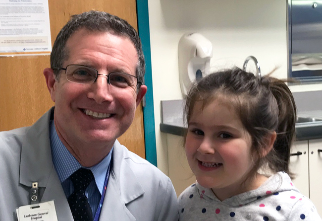 Dr. David Walner with an ENT patient